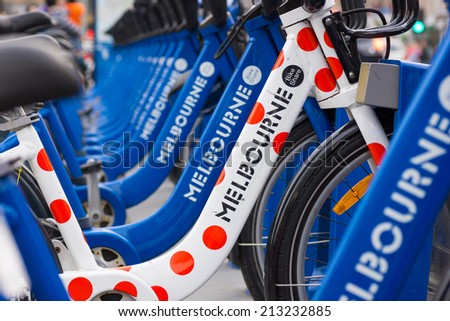 MELBOURNE, AUSTRALIA - AUGUST 16, 2014: Bicycles for hire as part of the Melbourne bike share program. Visitors can hire bikes to explore the city.