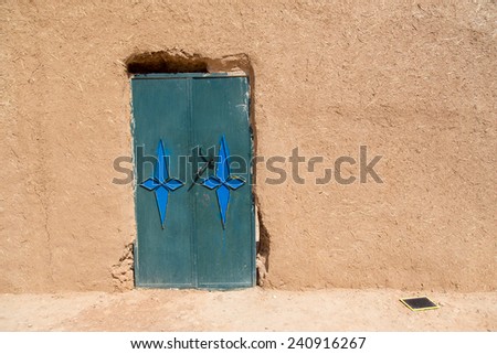 Traditional house and door in the desert of Morocco. nobody
