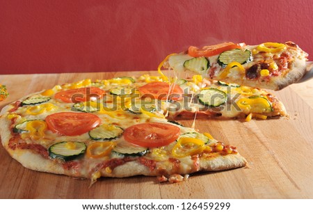 Supreme vegetarian Pizza Slice lift