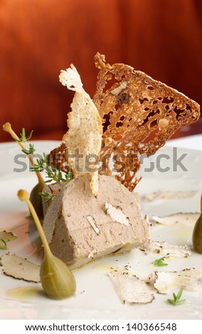 Foie gras pate with white truffles, capers and parmesan cheese