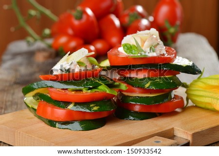 Insalata Caprese - Italian salad, made of Tomatoes, Zucchini and Buffalo Mozzarella Cheese
