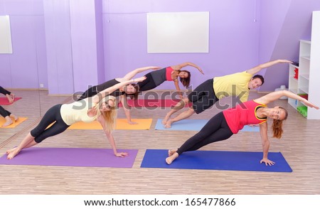 Aerobics Hot pilates class with yoga balls in a row on fitness class