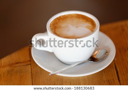 Coffee. Cappuccino. Cup of Cappuccino or Latte Coffee - Selective focus