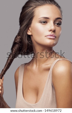 Fashion Portrait Of Beautiful Young Girl Making Hairstyle / Preparing For Night Club Party