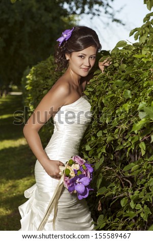 Fashionable Bride in the park
