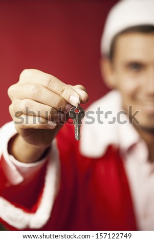 Santa gives the keys to the apartment