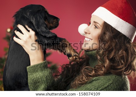 girl presented with a puppy