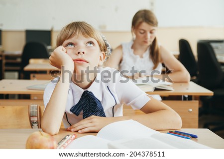 education and school concept - little student girl