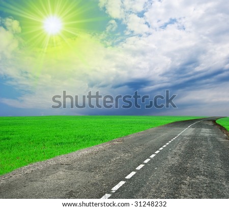 road leaving far under a sparkle sun