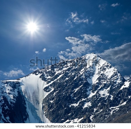 sparkle sun above a mountain