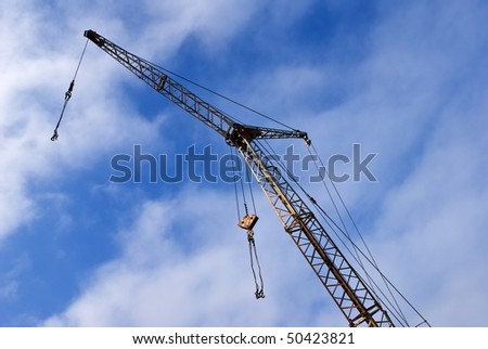 construction lifting crane on a sky background