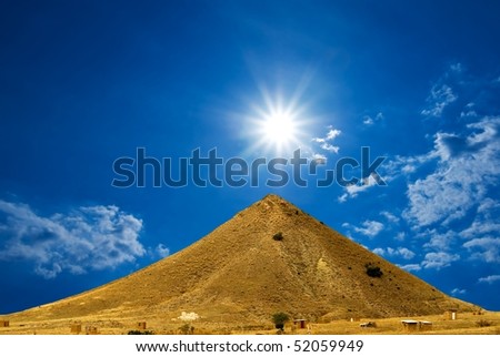 single mountain under a sun