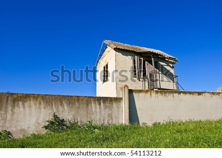 alone house on a blue sky background