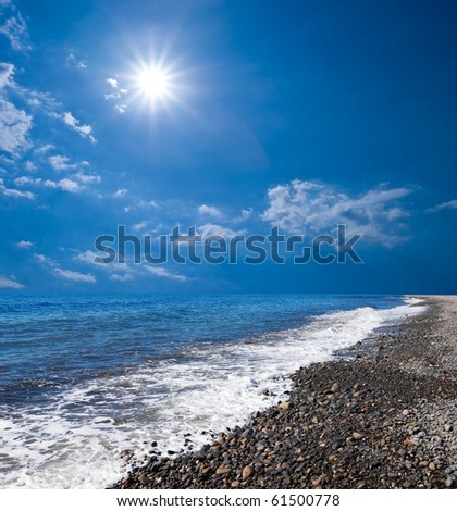 sea coast under a sparkle sun