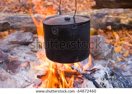 touristic cauldron  on a fire