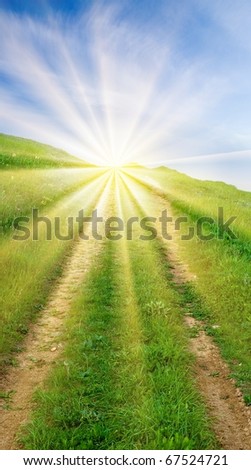 road in a rays of sparkle sun