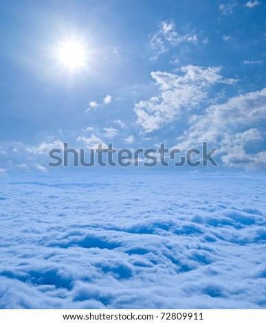 boundless blue clouds under a sparkle sun