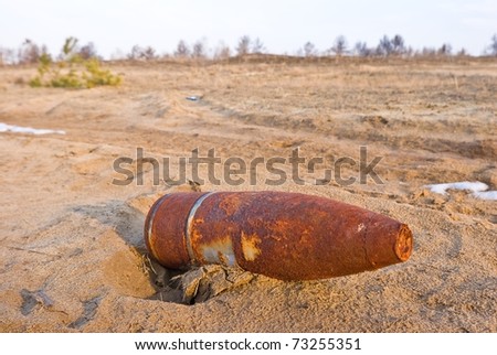 old rusty bom in a desert