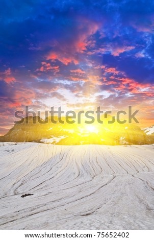 sparkle sun above a mountains