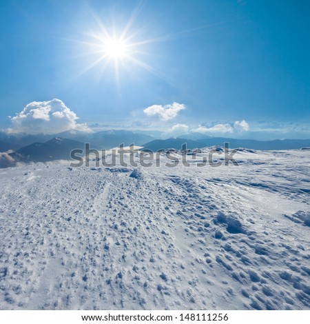 winter snowbound plain under a sparkle sun