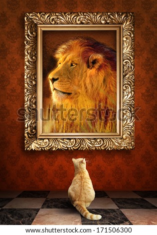 Cat looking at a portrait of a lion in a golden frame.