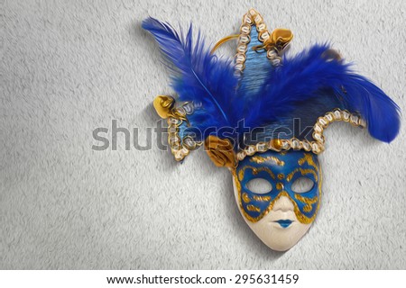 Venice carnival mask on wall