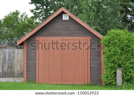 Wooden storage unit in backyard