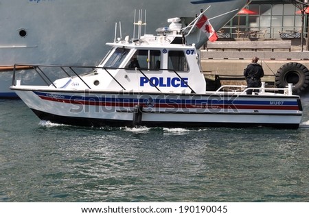 Toronto, Canada - April 27, 2014: The Toronto Police Marine Unit is responsible for all waterways within Toronto. They also enforce the Canada Shipping Act, Toronto Port Authority by-laws, etc.