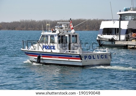 Toronto, Canada - April 27, 2014: The Toronto Police Marine Unit is responsible for all waterways within Toronto. They also enforce the Canada Shipping Act, Toronto Port Authority by-laws, etc.