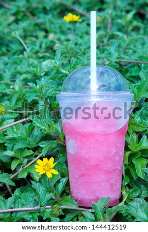 Fresh summer strawberry drink in an outdoor setting