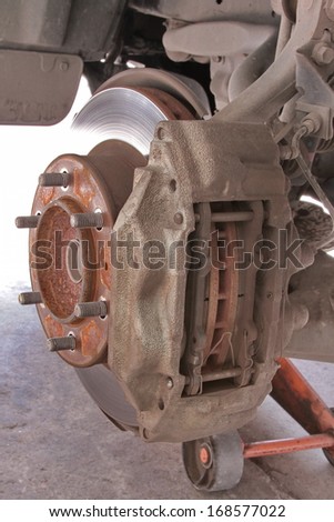 Front Disk brake assembly on a modern car - Brake job in progress
