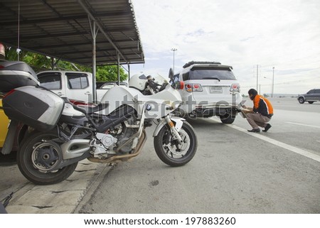 BANGKOK, THAILAND - JUNE 10:  Rescue forces in a deadly car accident scene on June 10 2014. Road accident coupe gray hit the SUV car on the freeway in rush hour.