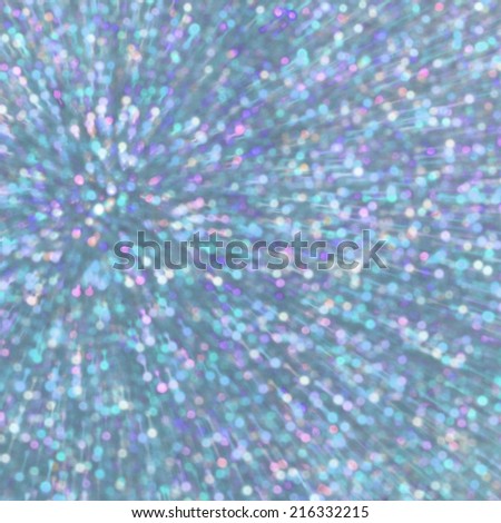 blue abstract explosion with glitter zoom bokeh lights background.