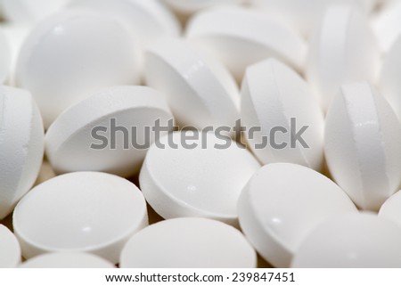 White pills medicament background