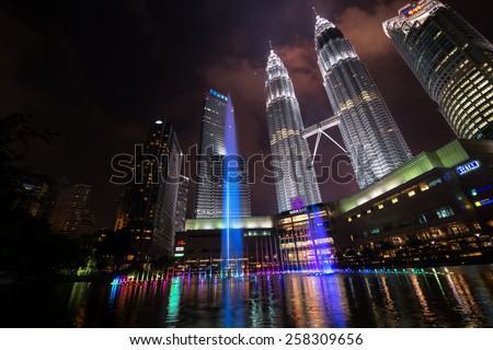 KUALA LUMPUR, MALAYSIA - CIRCA JANUARY 2015: Petronas Twin Towers at night. Petronas Twin Towers were the tallest buildings (452 m) in the world from 1998 to 2004.