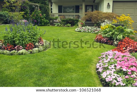 Manicured Yard.  A beautifully manicured residential yard full of blossoms.