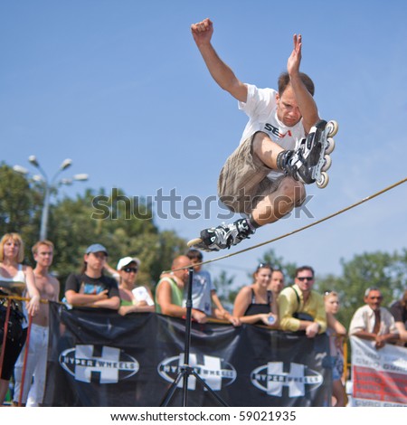 MOSCOW - JULY 31: Luzhniki Olympic arena, Kiryll Ryazantsev performs a jump - Annual Russian Rollerskating Federation Contest on July 31, 2010 in Moscow