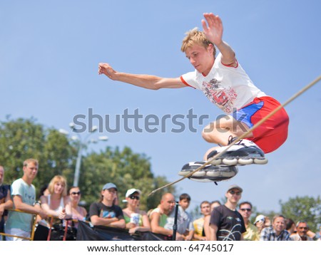 MOSCOW - JULY 31: Luzhniki Olympic arena, Aleksey Gulyagin performs a jump - Annual Russian Rollerskating Federation Contest on July 31, 2010 in Moscow