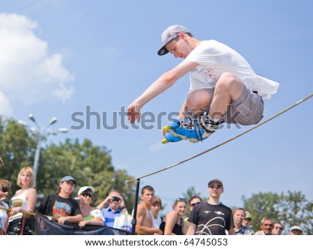 MOSCOW - JULY 31: Luzhniki Olympic arena, Mikhail Smirnov performs a jump - Annual Russian Rollerskating Federation Contest on July 31, 2010 in Moscow