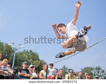 MOSCOW - JULY 31: Luzhniki Olympic arena, Kiryll Ryazantsev performs a jump - Annual Russian Rollerskating Federation Contest on July 31, 2010 in Moscow