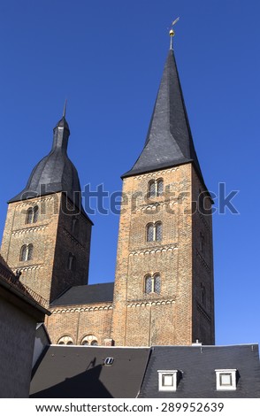 View to the two red towers of an old cloister and the medieval town in Altenburg in Thuringia. The Church is being the city\'s landmark called \