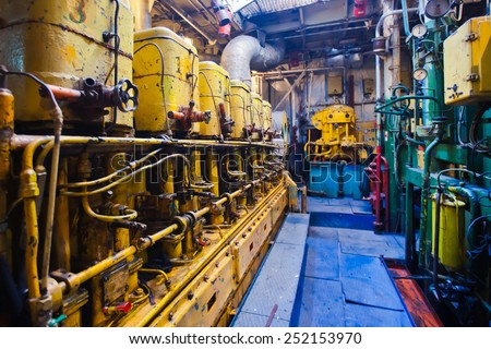 Engine room on a cargo boat ship, engine room on an oil platform, inside oil platform, inside ship