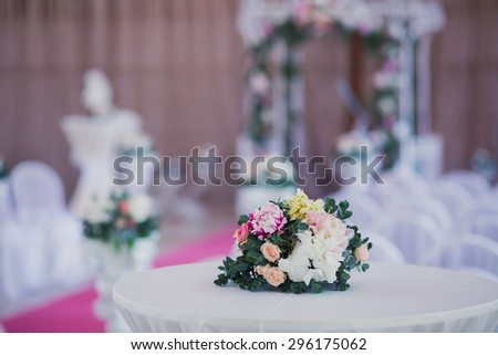 Beautiful wedding ceremony design decoration elements with arch, floral design, flowers, chairs and balloons