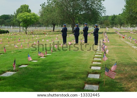 Airmen giving the farewell salute to a fallen veteran.