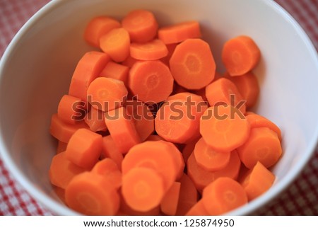 Carrots chopped and boiled ready to serve in a bowl.