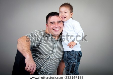 Dad and son in the studio, dad and son hugging