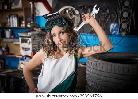 Female mechanic at work. auto service station, working girl. woman working in the garage