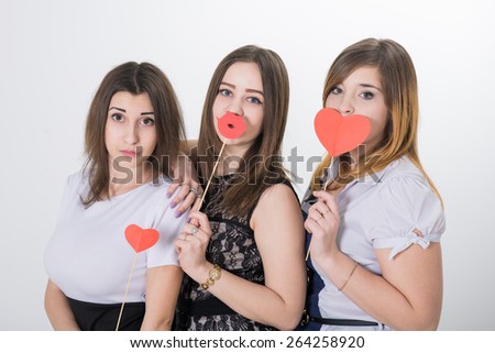 teen girls are friends. Pretty brunette girl friends  having fun. Looking at camera and smiling.