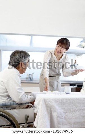 Helper and the elderly to talk