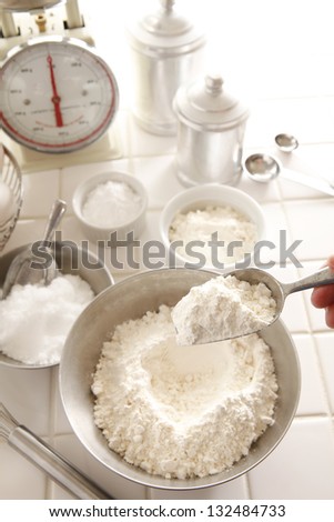 ingredients and tools to make a cake, flour, butter, sugar,eggs